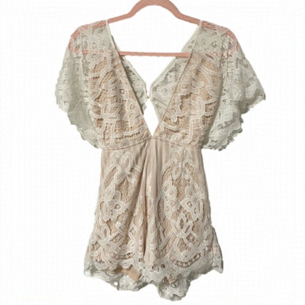 sold - Showpo. Deep V-neck White Lace Romper Size M